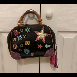 Vintage Dooney & Bourke with Charm Logo in black